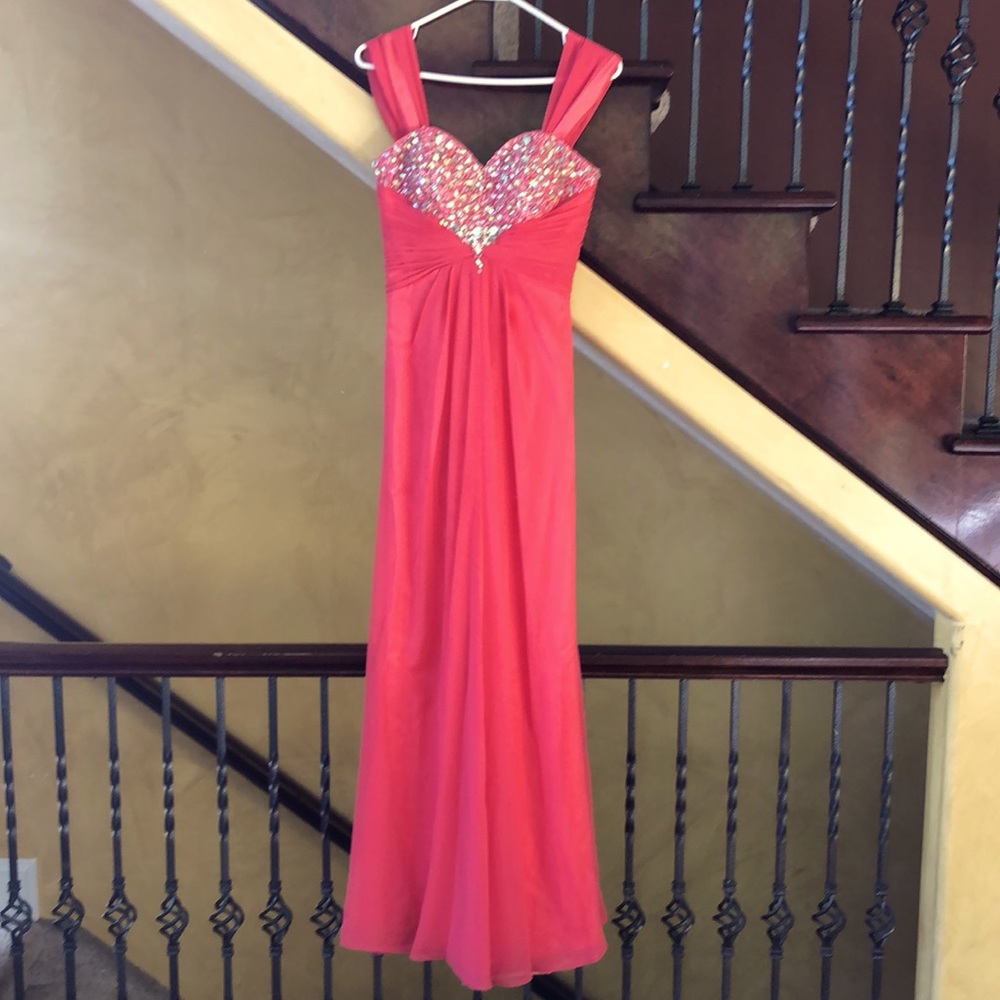 This coral dress has only been worn once and is in perfect condition